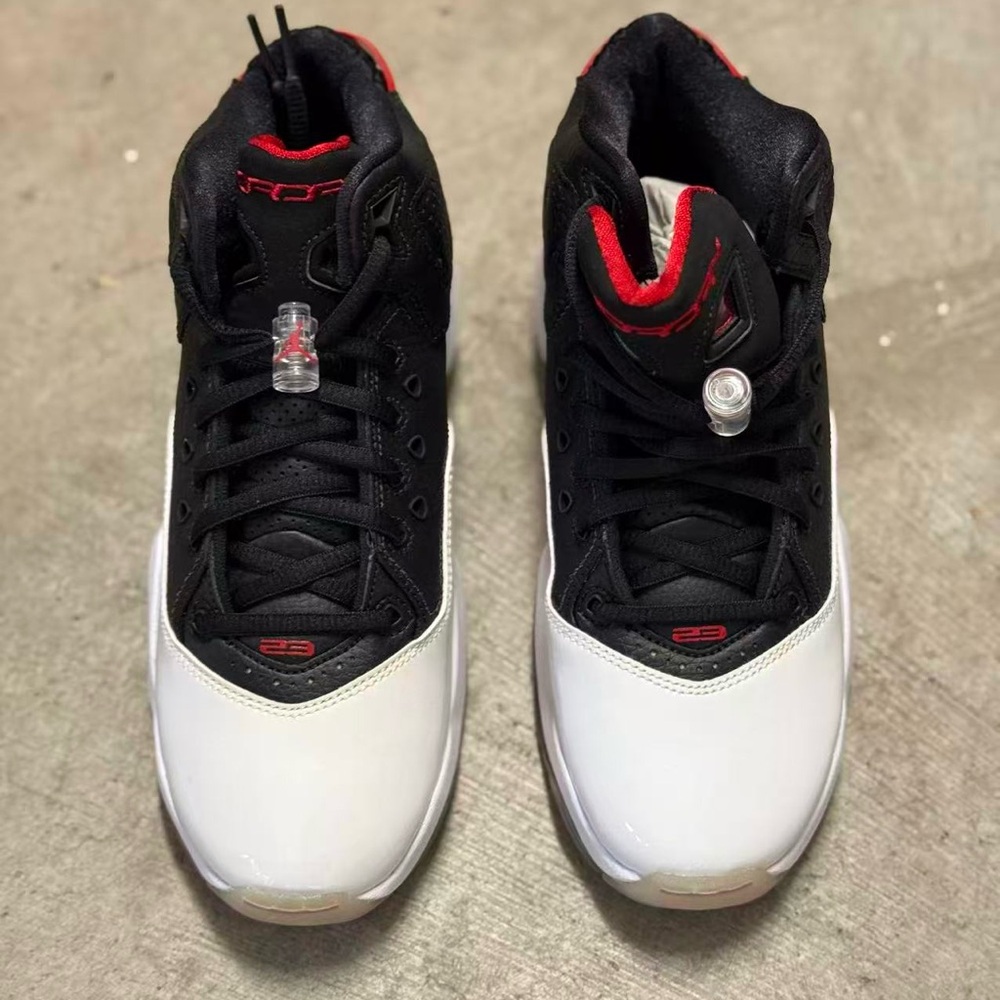 Girls Jordan Black and White Sneakers with Red Accents